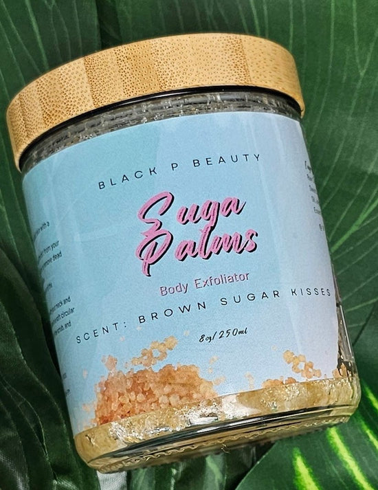 Glass jar with bamboo top filled with sugar scrub named Suga Palms.