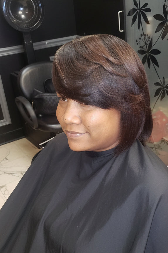 Person showcasing a silk press hairstyle