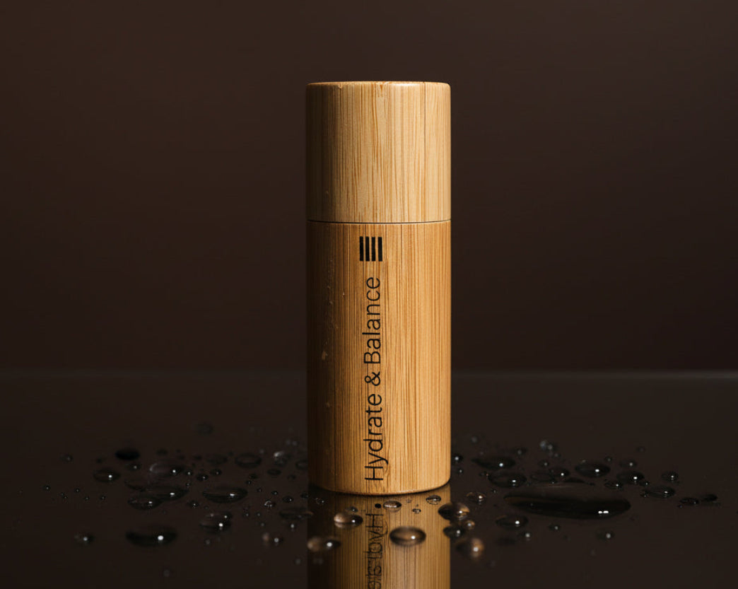 (HB) Body Oil Roller (Southern Drip) in bamboo packaging for smooth skin and hydration.